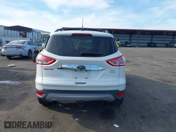 2013 Ford Escape SEL with VIN 1FMCU9H99DUA97959, listed as a IAAI auction lot 41879967 with 149,456 mi miles. Bid and sale history available at carsss.com. Image 16.
