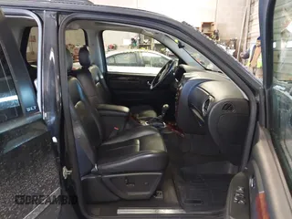 2007 GMC Envoy SLE with VIN 1GKDT13S472123167, listed as a IAAI auction lot 41385620 with 157,680 mi miles. Bid and sale history available at carsss.com. Image 5.