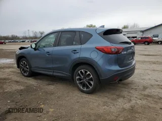 2016 Mazda CX-5 Grand Touring with VIN JM3KE2DY0G0748190, listed as a Copart auction lot 51913155 with 107,997 mi miles and Salvage Title. Bid and sale history available at carsss.com. Image 2.