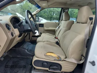 2007 Ford F-150 STX with VIN 1FTRX12W07NA02984, listed as a Copart auction lot 60305325 with 127,731 mi miles and Salvage title. Bid and sale history available at DreamBid. Image 7.