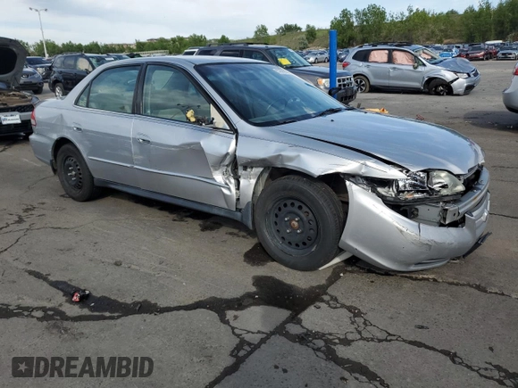 2002 Honda Accord LX z VIN JHMCG56442C016427, wystawiony jako Copart lot #57806335 z przebiegiem 176 816 mil mil oraz Szkoda całkowita • Salvage title. Historia ofert i sprzedaży dostępna na DreamBid. Obrazek 4.