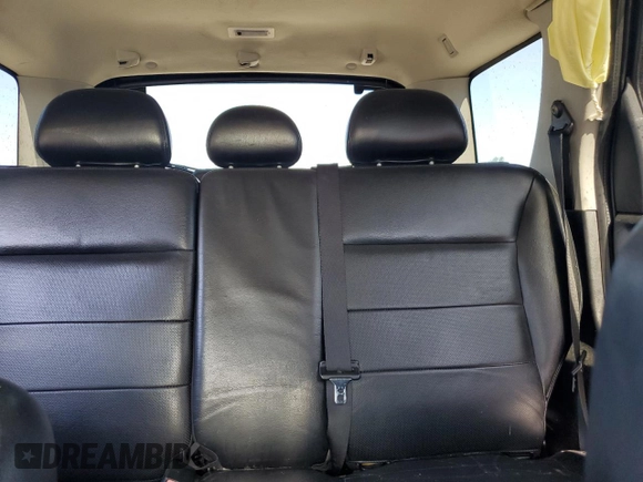 2006 Ford Escape Limited z VIN 1FMCU04146KA60909, wystawiony jako Copart lot #58019215 z przebiegiem 156 752 mil mil oraz Szkoda całkowita • Salvage title. Historia ofert i sprzedaży dostępna na DreamBid. Obrazek 10.