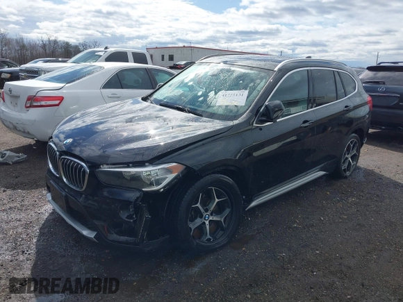 2018 BMW X1 xDrive28i z VIN WBXHT3C35J5L34646, wystawiony jako IAAI lot #41725131 z przebiegiem 81 983 mil mil oraz . Historia ofert i sprzedaży dostępna na DreamBid. Obrazek 17.
