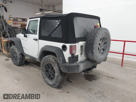 2016 Jeep Wrangler Sport with VIN 1C4AJWAG9GL261958, listed as a IAAI auction lot 41595490 with 32,433 mi miles and . Bid and sale history available at carsss.com. Image 3.