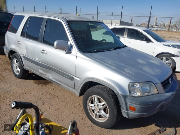 1998 Honda CR-V EX with VIN JHLRD1863WC074582, listed as a IAAI auction lot 41702456 with 243,674 mi miles. Bid and sale history available at carsss.com. Image 1.