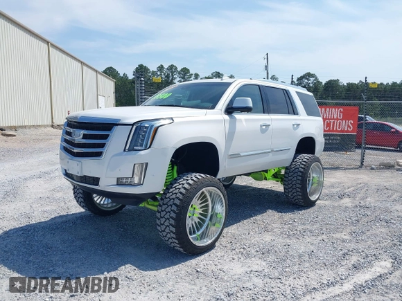 2020 Cadillac Escalade Luxury z VIN 1GYS3BKJ6LR124477, wystawiony jako IAAI lot #42042960 z przebiegiem 42 854 mil mil oraz . Historia ofert i sprzedaży dostępna na DreamBid. Obrazek 2.