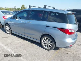 2012 Mazda 5 Grand Touring with VIN JM1CW2DL6C0126640, listed as a IAAI auction lot 42076722 with 124,412 mi miles and . Bid and sale history available at DreamBid. Image 3.