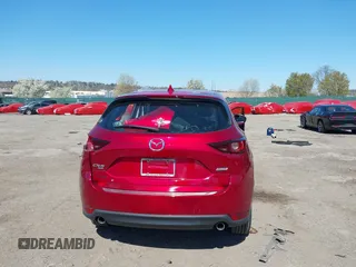 2019 Mazda CX-5 Sport with VIN JM3KFBBM6K1596402, listed as a IAAI auction lot 41971766 with 60,396 mi miles and . Bid and sale history available at DreamBid. Image 17.