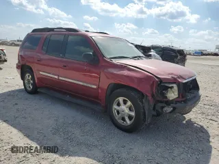 2002 GMC Envoy SLT with VIN 1GKES16S526121741, listed as a Copart auction lot 71957034 with 276,328 mi miles and Salvage Title. Bid and sale history available at DreamBid. Image 4.