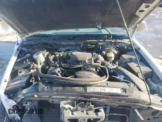 2000 GMC Envoy z VIN 1GKDT13W4Y2348984, wystawiony jako Copart lot #89062865 z przebiegiem 159 592 mil mil oraz Szkody całkowita. Historia ofert i sprzedaży dostępna na DreamBid. Obrazek 13.