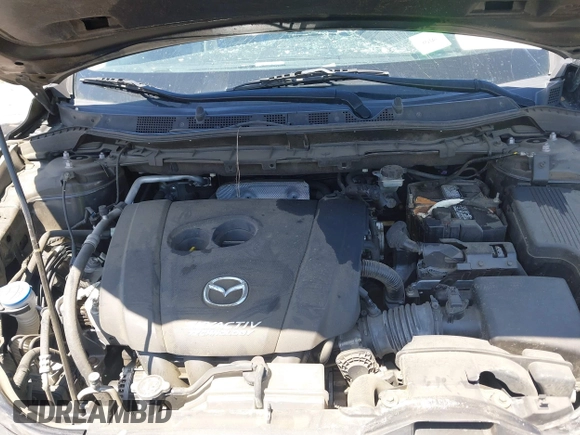 2016 Mazda CX-5 Sport with VIN JM3KE2BY4G0807776, listed as a IAAI auction lot 42206641 with 136,809 mi miles and . Bid and sale history available at DreamBid. Image 10.