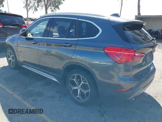 2018 BMW X1 sDrive28i with VIN WBXHU7C36J5L05628, listed as a IAAI auction lot 41708522 with 91,352 mi miles and . Bid and sale history available at DreamBid. Image 3.