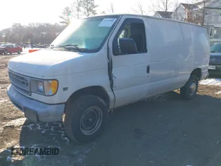 1999 Ford Econoline Cargo Commercial with VIN 1FTNE24L6XHB25183, listed as a IAAI auction lot 41391984 with 205,804 mi miles and . Bid and sale history available at carsss.com. Image 2.