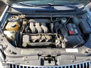 2007 Mercury Montego Premier with VIN 1MEHM43127G614096, listed as a Copart auction lot 77359084 with 121,444 mi miles and Salvage Title. Bid and sale history available at carsss.com. Image 12.