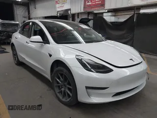 2023 Tesla Model 3 Long Range with VIN 5YJ3E1EB3PF603955, listed as a IAAI auction lot 41915541 with 33,691 mi miles and . Bid and sale history available at DreamBid. Image 6.