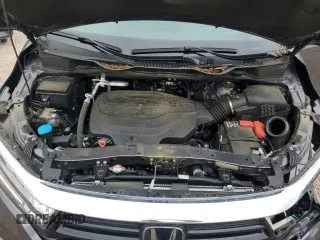 2023 Honda Odyssey Touring with VIN 5FNRL6H86PB024066, listed as a Copart auction lot 58414575 with 29,827 mi miles and Salvage title. Bid and sale history available at DreamBid. Image 12.