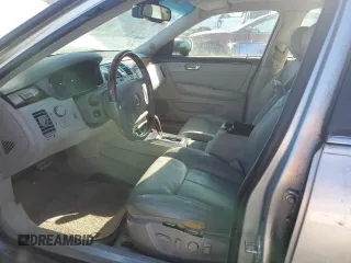 2006 Cadillac DTS 1SE with VIN 1G6KD57956U189859, listed as a Copart auction lot 89266305 with 153,549 mi miles and Salvage Title. Bid and sale history available at DreamBid. Image 7.