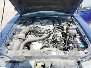 2004 Ford Mustang Deluxe with VIN 1FAFP44454F126387, listed as a IAAI auction lot 41948123 with 114,686 mi miles. Bid and sale history available at carsss.com. Image 10.