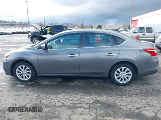 2019 Nissan Sentra SV with VIN 3N1AB7AP5KY357883, listed as a IAAI auction lot 41783436 with 89,636 mi miles and . Bid and sale history available at DreamBid. Image 14.
