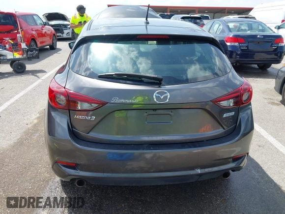 2018 Mazda 3 Touring z VIN 3MZBN1L35JM271525, wystawiony jako IAAI lot #42112552 z przebiegiem 107 299 mil mil oraz . Historia ofert i sprzedaży dostępna na DreamBid. Obrazek 16.