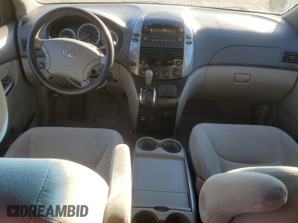 2010 Toyota Sienna with VIN 5TDZK4CCXAS335182, listed as a Copart auction lot 73518054 with 180,248 mi miles and Clean Title. Bid and sale history available at DreamBid. Image 8.