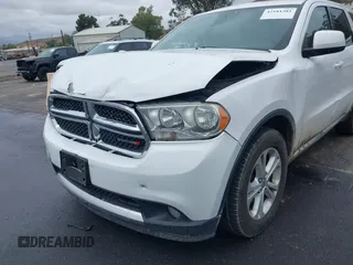 2013 Dodge Durango SXT z VIN 1C4RDHAG7DC694986, wystawiony jako IAAI lot #42181381 z przebiegiem 170 669 mil mil oraz . Historia ofert i sprzedaży dostępna na DreamBid. Obrazek 6.