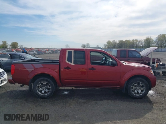 2021 Nissan Frontier SV z VIN 1N6ED0EA8MN718185, wystawiony jako IAAI lot #41878389 z przebiegiem 40 315 mil mil oraz . Historia ofert i sprzedaży dostępna na DreamBid. Obrazek 13.
