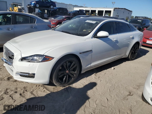 2016 Jaguar XJ Portfolio with VIN SAJWA2G72G8W00103, listed as a Copart auction lot 81347664 with 45,917 mi miles and Salvage title. Bid and sale history available at DreamBid. Image 1.