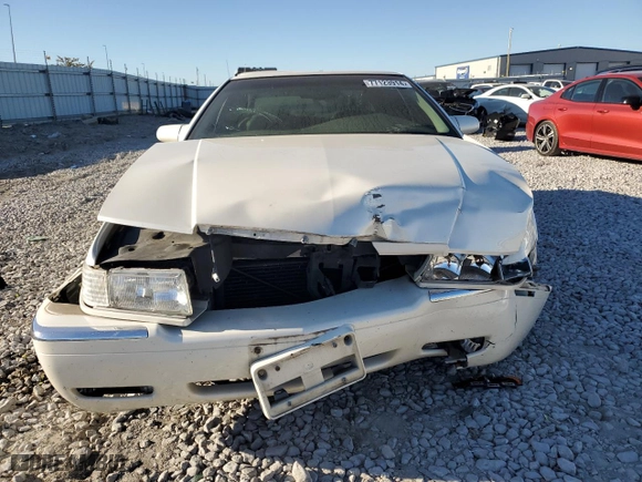 2000 Cadillac Eldorado with VIN 1G6EL12Y5YU176121, listed as a Copart auction lot 77123914 with 91,663 mi miles and Salvage Title. Bid and sale history available at carsss.com. Image 5.
