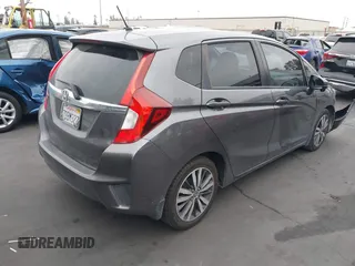 2015 Honda Fit EX-L with VIN 3HGGK5H82FM731732, listed as a IAAI auction lot 42164252 with 99,461 mi miles and . Bid and sale history available at DreamBid. Image 4.