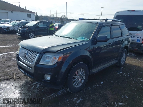 2010 Mercury Mariner Premier with VIN 4M2CN9HG6AKJ27176, listed as a IAAI auction lot 41607396 with 131,213 mi miles and . Bid and sale history available at DreamBid. Image 2.