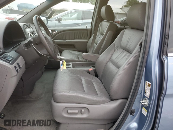 2010 Honda Odyssey EX-L with VIN 5FNRL3H6XAB004567, listed as a Copart auction lot 82709814 with 142,551 mi miles and Clean Title. Bid and sale history available at carsss.com. Image 7.