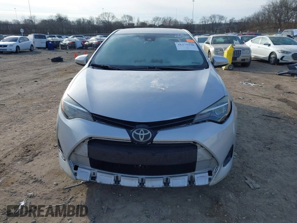 2019 Toyota Corolla L with VIN 2T1BURHE7KC223002, listed as a IAAI auction lot 41371130 with 251,534 mi miles and . Bid and sale history available at carsss.com. Image 13.