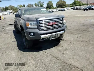 2016 GMC Canyon 4WD SLE with VIN 1GTG6CE34G1317723, listed as a Copart auction lot 68897634 with 61,975 mi miles and Salvage Title. Bid and sale history available at carsss.com. Image 11.
