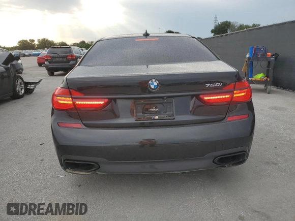 2016 BMW 7 Series 750i with VIN WBA7F0C56GGL99533, listed as a Copart auction lot 59091045 with 124,624 mi miles and Clean title. Bid and sale history available at DreamBid. Image 6.