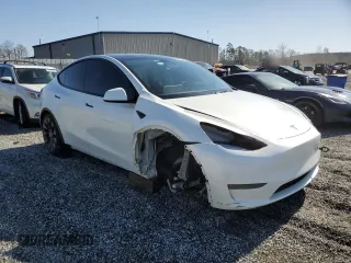 2023 Tesla Model Y Performance with VIN 7SAYGDEF4PF665873, listed as a Copart auction lot 49620705 with 39,239 mi miles and Salvage Title. Bid and sale history available at DreamBid. Image 4.