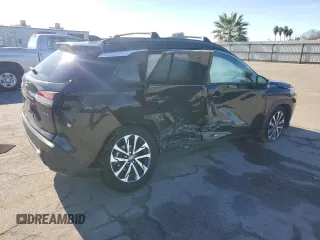 2024 Toyota Corolla Cross XLE with VIN 7MUDAAAGXRV073103, listed as a Copart auction lot 86753294 with 5,667 mi miles and Salvage title. Bid and sale history available at DreamBid. Image 3.