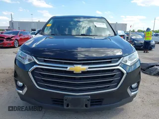 2019 Chevrolet Traverse LT Cloth z VIN 1GNERGKW8KJ138606, wystawiony jako IAAI lot #42224318 z przebiegiem 155 959 mil mil oraz . Historia ofert i sprzedaży dostępna na DreamBid. Obrazek 12.