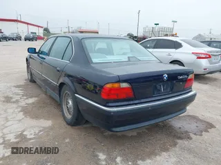 1998 BMW 7 Series 740il with VIN WBAGJ8327WDM19260, listed as a IAAI auction lot 41482326 with 1 mi miles. Bid and sale history available at carsss.com. Image 3.