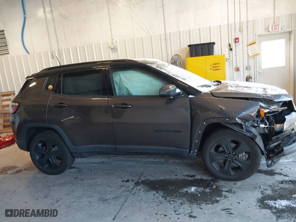 2019 Jeep Compass Latitude with VIN 3C4NJDBB0KT786610, listed as a IAAI auction lot 41261689 with 70,511 mi miles. Bid and sale history available at carsss.com. Image 13.