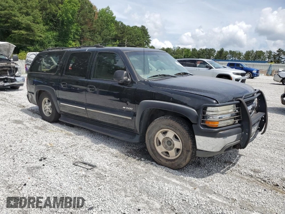 2000 Chevrolet Suburban LS with VIN 3GNFK16T5YG190971, listed as a Copart auction lot 60264695 with Not provided miles and Salvage title. Bid and sale history available at DreamBid. Image 4.