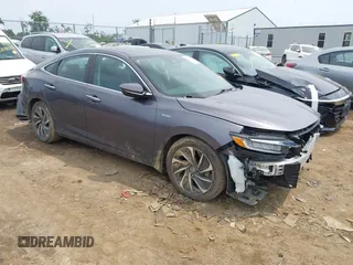 2021 Honda Insight Touring with VIN 19XZE4F97ME001133, listed as a IAAI auction lot 42477281 with 62,394 mi miles and . Bid and sale history available at DreamBid. Image 1.