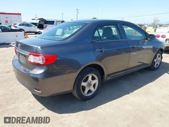 2012 Toyota Corolla L with VIN 5YFBU4EEXCP054988, listed as a IAAI auction lot 41973361 with 193,390 mi miles. Bid and sale history available at carsss.com. Image 4.