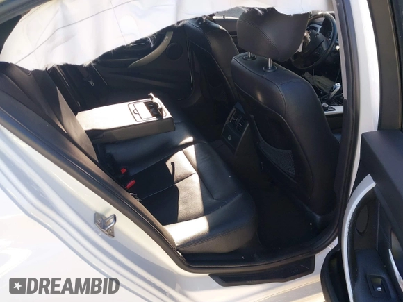 2013 BMW 3 Series 328i with VIN WBA3C1G55DNR49447, listed as a IAAI auction lot 41296098 with 126,605 mi miles and . Bid and sale history available at DreamBid. Image 8.