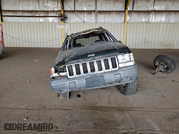 1996 Jeep Grand Cherokee Laredo with VIN 1J4GZ58S6TC304597, listed as a Copart auction lot 52962545 with Not provided miles and Salvage title. Bid and sale history available at DreamBid. Image 5.
