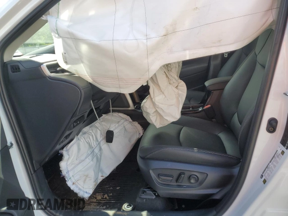 2024 Toyota Corolla Cross XLE with VIN 7MUDAAAGXRV116208, listed as a Copart auction lot 54705515 with 8,557 mi miles and Salvage title. Bid and sale history available at DreamBid. Image 7.