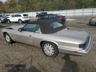 1996 Jaguar XJS with VIN SAJNX2742TC224462, listed as a Copart auction lot 79755744 with 120,724 mi miles and Salvage Title. Bid and sale history available at carsss.com. Image 2.