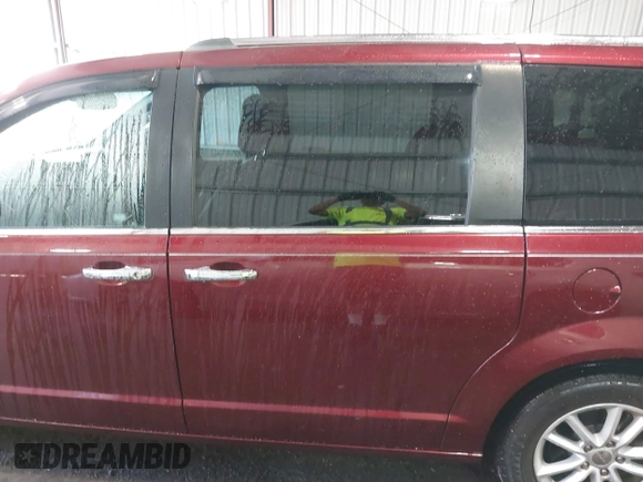 2018 Dodge Grand Caravan SXT with VIN 2C4RDGCG4JR297603, listed as a IAAI auction lot 42144645 with 114,098 mi miles and . Bid and sale history available at DreamBid. Image 14.