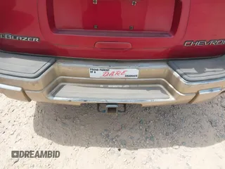 2004 Chevrolet TrailBlazer LS with VIN 1GNDT13S042190606, listed as a IAAI auction lot 42165900 with 298,141 mi miles. Bid and sale history available at carsss.com. Image 12.