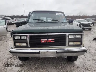 1990 GMC Suburban z VIN 1GKGR26K8LF528125, wystawiony jako Copart lot #84931724 z przebiegiem Nie podano mil oraz Szkody całkowita. Historia ofert i sprzedaży dostępna na DreamBid. Obrazek 5.